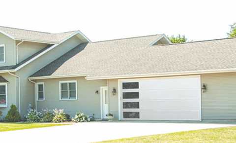 Classic Contemporary residential garage door.